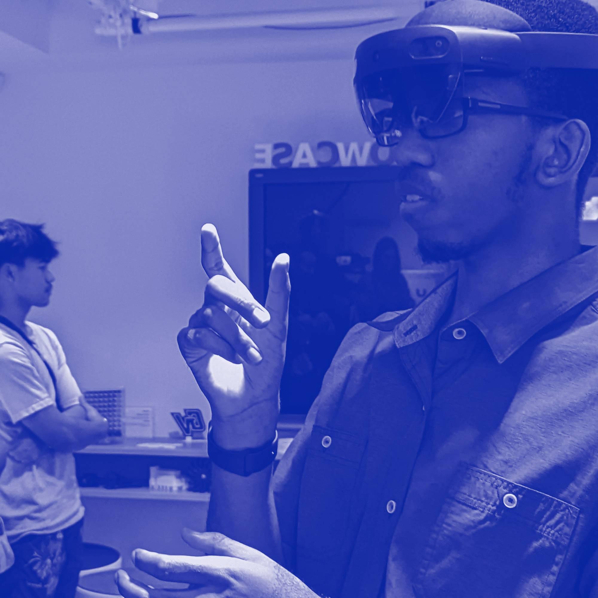 A student with a microsoft hololens on